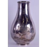 A GOOD 19TH CENTURY JAPANESE MEIJI PERIOD SILVER VASE decorated in relief with fowl roaming within