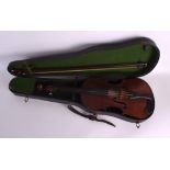 A CASED TWO PIECE BACK VIOLIN with bow, bearing label to interior 'The Barnes & Mullins,
