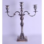 AN ADAMS STYLE ENGLISH SILVER TWIN BRANCH CANDLESTICK decorated with neo classical mask heads.