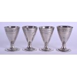 A GOOD SET OF 18TH/19TH CENTURY TURKISH OTTOMAN SILVER CUPS engraved with motifs. 6.4 oz. 6 cm