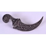 A 19TH CENTURY MIDDLE EASTERN ISLAMIC SILVER KNIFE BROOCH decorated with script. 8.5 cm wide.