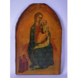 A 20TH CENTURT CARVED WOODEN ICON, lacquered detail depicting Mary and baby Jesus. 38.5 cm.