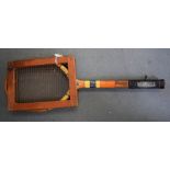 A VINTAGE WOODEN TENNIS RACKET, "A Dunlop Production. 67.5 cm long.