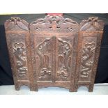 A LATE 19TH CENTURY CHINESE BURMESE TIBETAN CARVED WOODEN SCREEN decorated with mythical