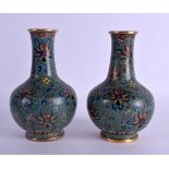 A PAIR OF 18TH/19TH CENTURY CHINESE CLOISONNE ENAMEL VASES Qianlong/Jiaqing, decorated in the Ming