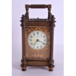 A LATE 19TH CENTURY FRENCH GILT BRONZE HOUR REPEATING CARRIAGE CLOCK the case with outset pillars,