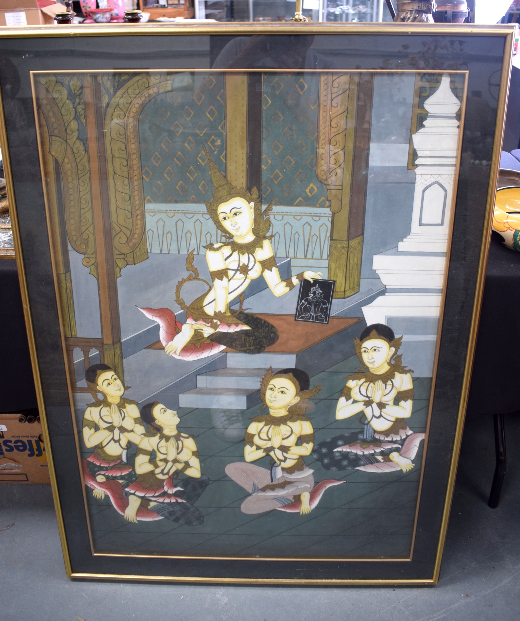 SOUTHEAST ASIAN SCHOOL, framed gouache on silk, buddhistic figures in a temple. 106 cm x 73 cm.