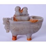A CHINESE MUTTON JADE TEA POT, carved in the Archaic style , the finial in the form of a young