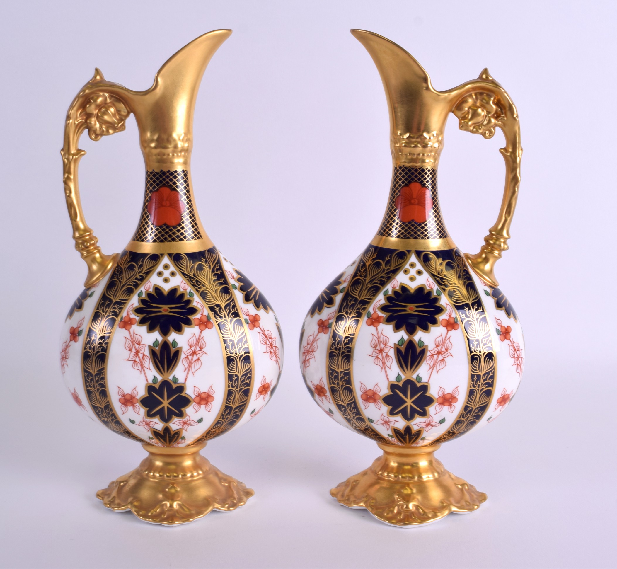 A PAIR OF ROYAL CROWN DERBY IMARI JUGS Pattern 1128. 27 cm high. - Image 2 of 3