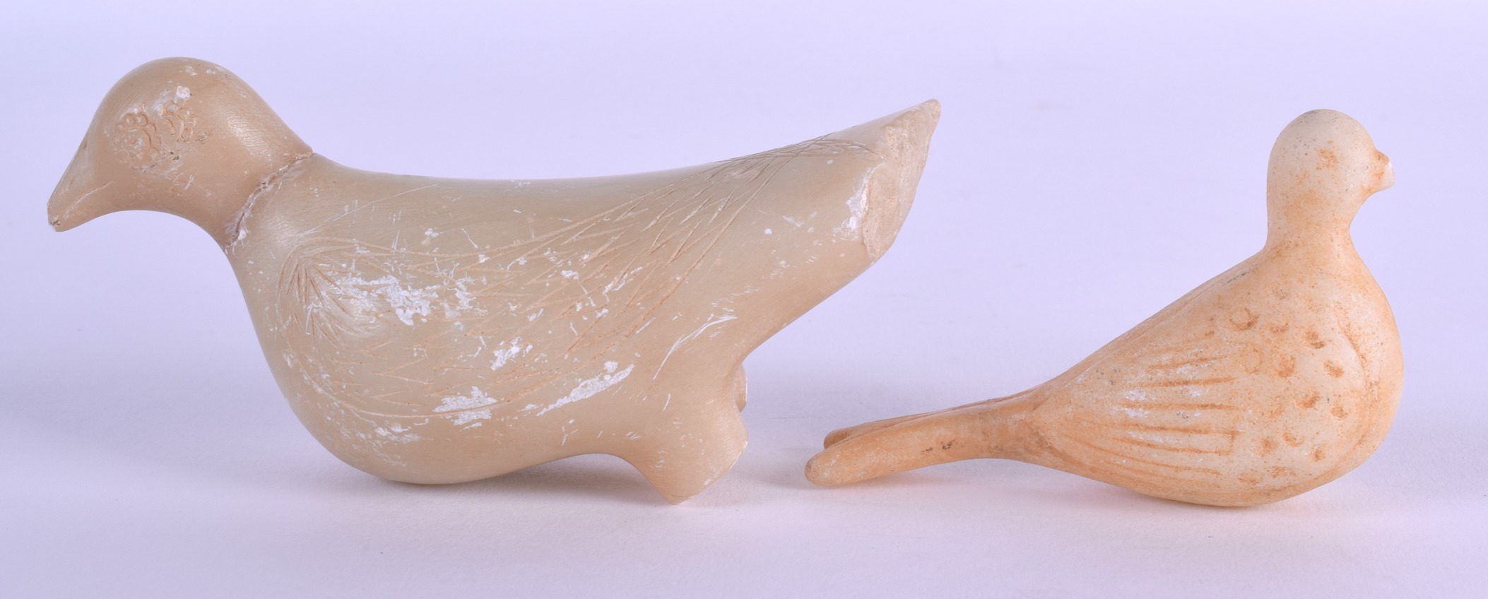 TWO 18TH/19TH CENTURY CENTRAL ASIAN CARVED STONE BIRDS with incised features. 12 cm & 9 cm wide. ( - Image 2 of 4