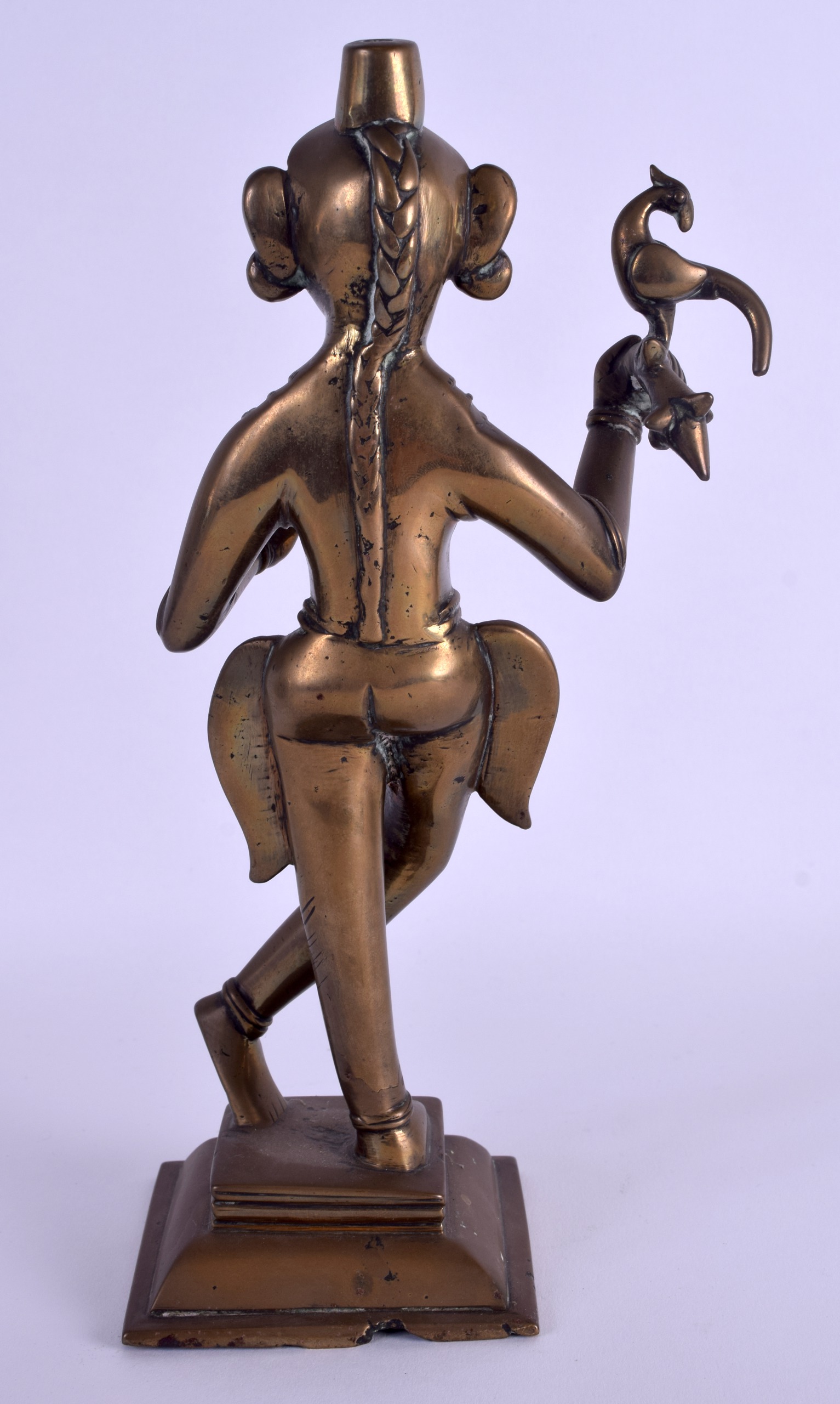 AN 18TH CENTURY INDIAN BRONZE FIGURE OF A STANDING DEITY modelled holding a Buddhistic ritual vessel - Image 2 of 3
