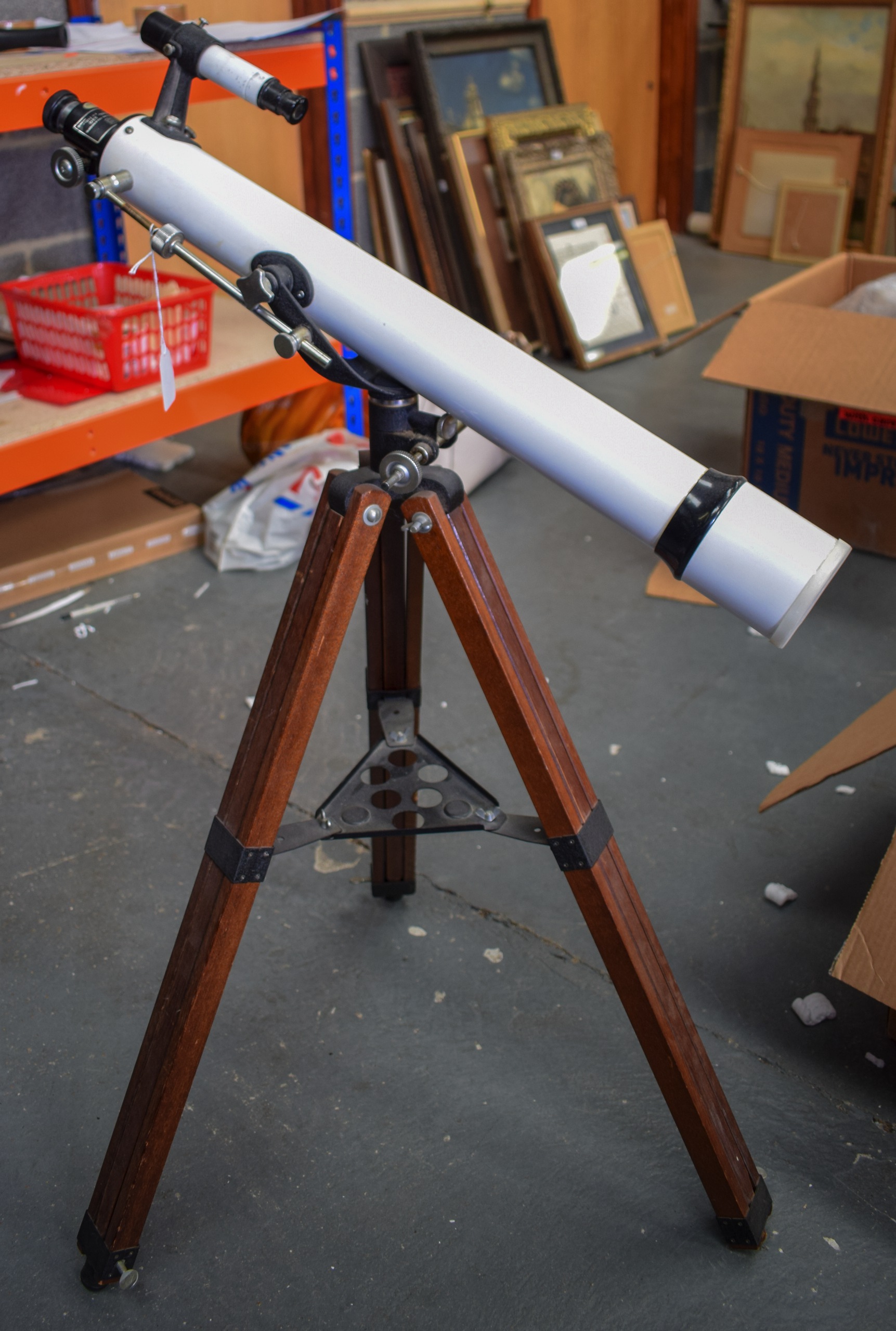 A VINTAGE PRINZ OPTICS ASTRONOMICAL TELESCOPE, with wooden fixed tripod. 100 cm high.