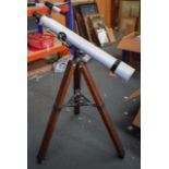 A VINTAGE PRINZ OPTICS ASTRONOMICAL TELESCOPE, with wooden fixed tripod. 100 cm high.