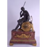 A MID 19TH CENTURY FRENCH BRONZE MARBLE AND ORMOLU MANTEL CLOCK modelled as a seated male soldier