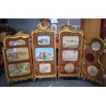A LARGE 19TH/20TH CENTURY GILTWOOD SCREEN, inset with panels of watercolour by various artists.