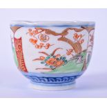 A 19TH CENTURY JAPANESE EDO PERIOD PORCELAIN KUTANI BOWL, painted with panels of foliage. 8.5 cm