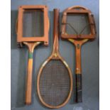 THREE VINTAGE WOODEN TENNIS RACKETS, "Uandi" and "Queens" together with another. (3)