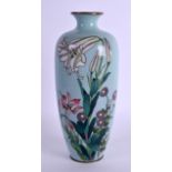 AN UNUSUAL EARLY 20TH CENTURY JAPANESE MEIJI PERIOD CLOISONNE ENAMEL VASE decorated with flowers.