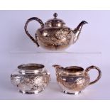 A LATE 19TH CENTURY JAPANESE MEIJI PERIOD THREE PIECE SILVER TEASET signed Bisansha, decorated