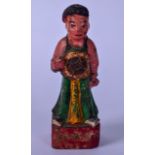 AN EARLY 20TH CENTURY CHINESE LACQUERED WOODEN FIGURE OF A MALE, modelled standing upon a square
