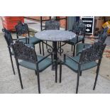 GOOD WROUGHT IRON TABLE WITH MARBLE TOP, together with seven iron chairs, the backsplats with bold