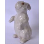 A CRACKLE GLAZED PORCELAIN FIGURE OF A RABBIT, modelled standing on its hind legs. 25 cm high.