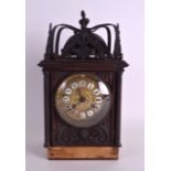 A 19TH CENTURY CONTINENTAL WOODEN AND BRASS MANTEL CLOCK with open work frieze and brass dial. 32 cm