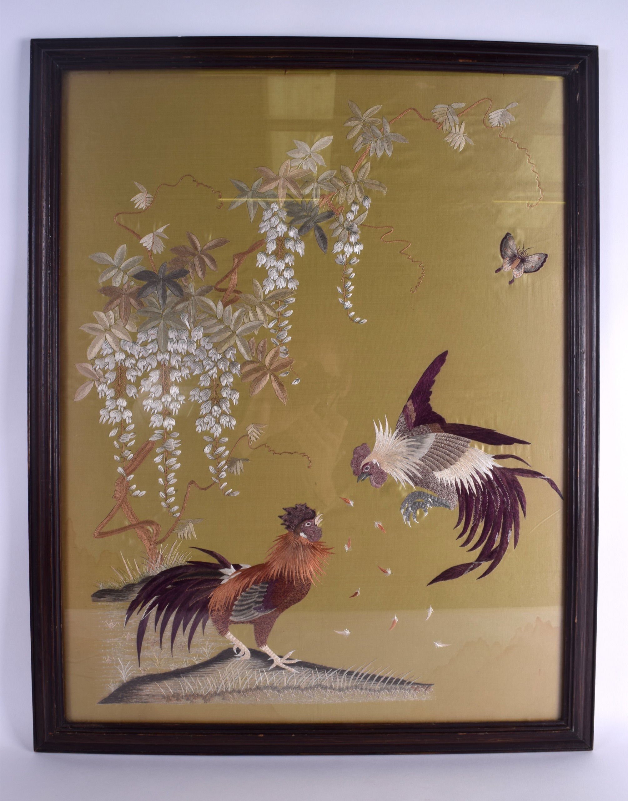 A 19TH CENTURY CHINESE SILKWORK EMBROIDERED PANEL Late Qing, depicting insects and fowl amongst