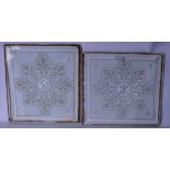A PAIR OF GLASS PANELS, etched with foliage. 35 cm x 32 cm.