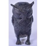 A 20TH CENTURY BRONZE SCULPTURE OF AN OWL, modelled standing. 9.5 cm.