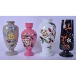 A GROUP OF FOUR EARLY 20TH CENTURY OVERLAID GLASS VASES, decorated with flowers. Largest 27 cm