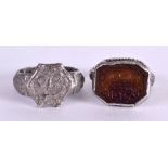 TWO EARLY MIDDLE EASTERN SILVER RINGS. (2)