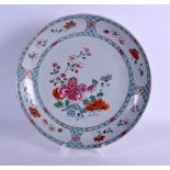 AN EARLY 18TH CENTURY CHINESE EXPORT FAMILLE ROSE DISH Qianlong, painted with floral sprays. 24 cm