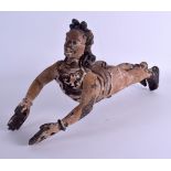 AN UNUSUAL 19TH CENTURY INDIAN POLYCHROMED WOODEN HANGING BUDDHISTIC FIGURE modelled in flight