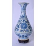 A CHINESE BLUE AND WHITE PORCELAIN VASE ON HARDWOOD STAND, painted in the Yuan style with stylised