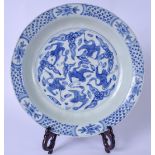 A CHINESE BLUE AND WHITE PORCELAIN DISH BEARING WANLI MARKS, hand painted with cranes in flight,