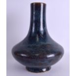 A 19TH CENTURY CHINESE BULBOUS COMPRESSED VASE decorated with a robins egg type glaze. 28 cm x 19