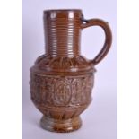 AN UNUSUAL 17TH/18TH CENTURY GERMAN SALT GLAZED BELLARMINE JUG unusually finely decorated with