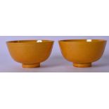 A PAIR OF CHINESE YELLOW GROUND PORCELAIN BOWLS BEARING DAOGUANG MARKS, incised with a dragon and