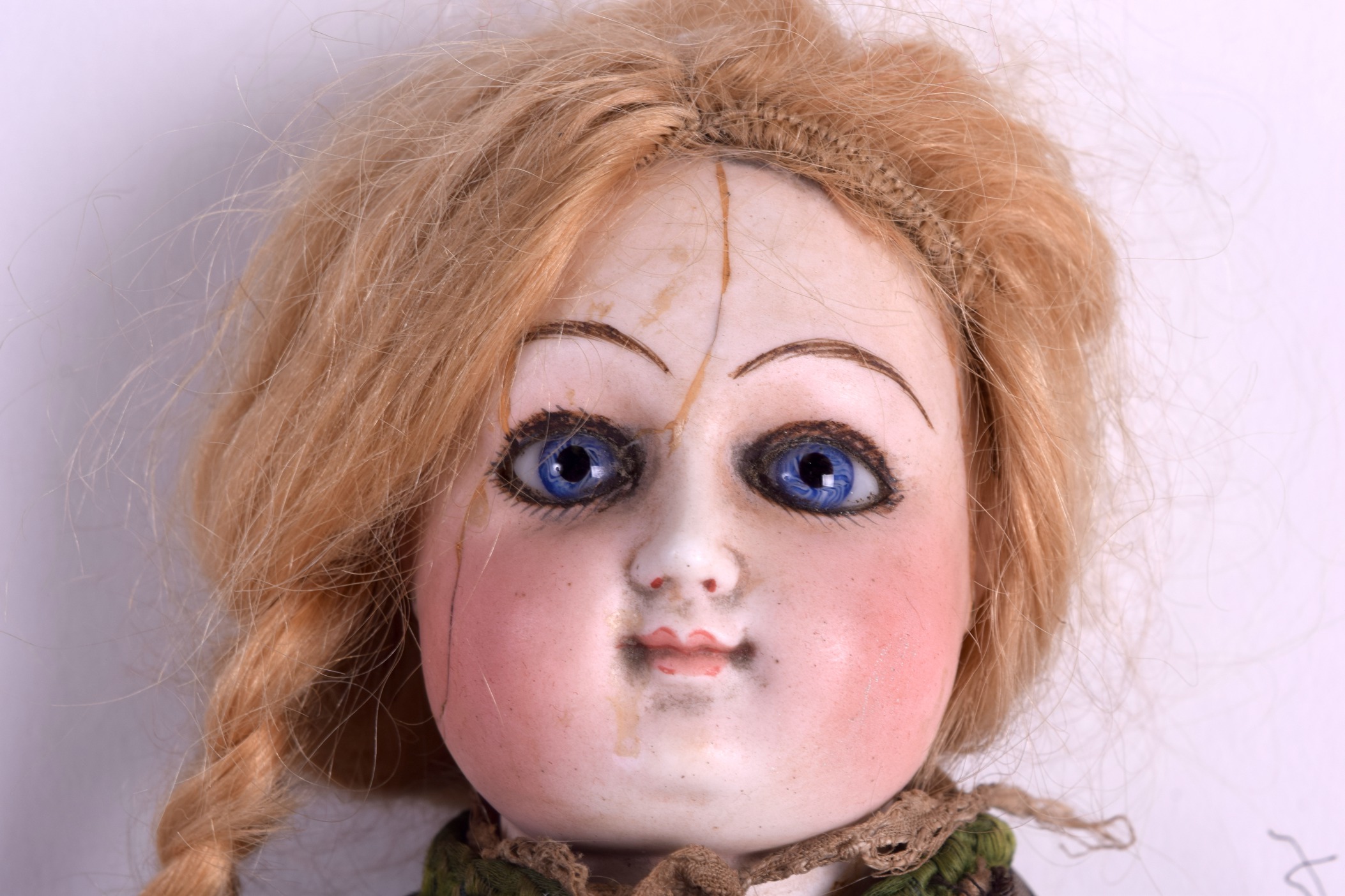 A 19TH CENTURY FRENCH PORCELAIN HEADED DOLL possibly by Bebe Jumeau, modelled in period green and - Image 2 of 5