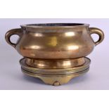 A GOOD 18TH/19TH CENTURY CHINESE BRONZE CENSER ON STAND Qing. Censer 1910 grams, stand 841 grams.