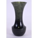 AN EARLY 20TH CENTURY CHINESE CARVED SPINACH JADE VASE of baluster form. 11.5 cm high.