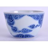 AN UNUSUAL 19TH CENTURY CHINESE BLUE AND WHITE PORCELAIN TEABOWL painted with clouds. 6.5 cm