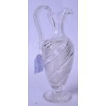 A LARGE CUT GLASS CLARET JUG OR EWER BY STEVENS & WILLIAMS, formed on pedestal base with high loop