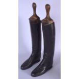 A PAIR OF ANTIQUE LEATHER RIDING BOOTS. 48 cm high.