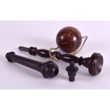 A MID 19TH CENTURY BOXWOOD TREEN BILBO GAME together with a treen needle case and cover. (2)