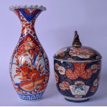 A JAPANESE IMARI VASE WITH FLARED NECK, together with an imari bowl and cover. Vase 31 cm.