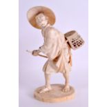 A GOOD 19TH CENTURY JAPANESE MEIJI PERIOD CARVED IVORY OKIMONO modelled as a male bird catcher,