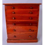 AN EARLY 20TH CENTURY WOODEN SPECIMEN OR SLIDE CABINET, formed with six graduated drawers. 45 cm x