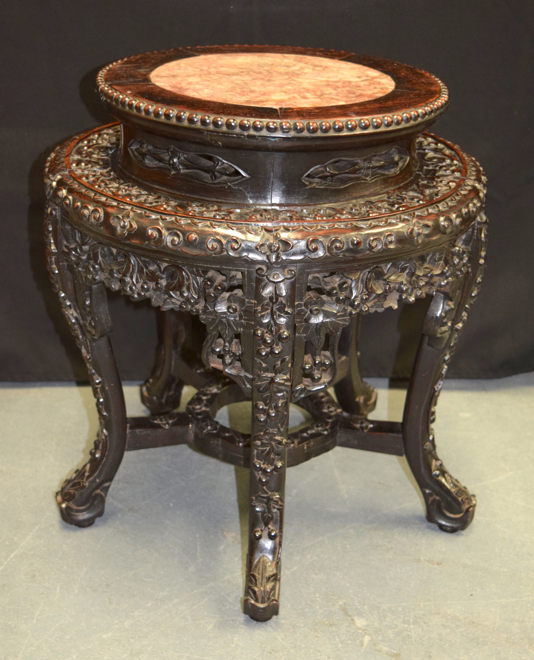 A FINE 19TH CENTURY CHINESE CARVED HONGMU AND MARBLE STAND Qing, decorated with flowers and trailing